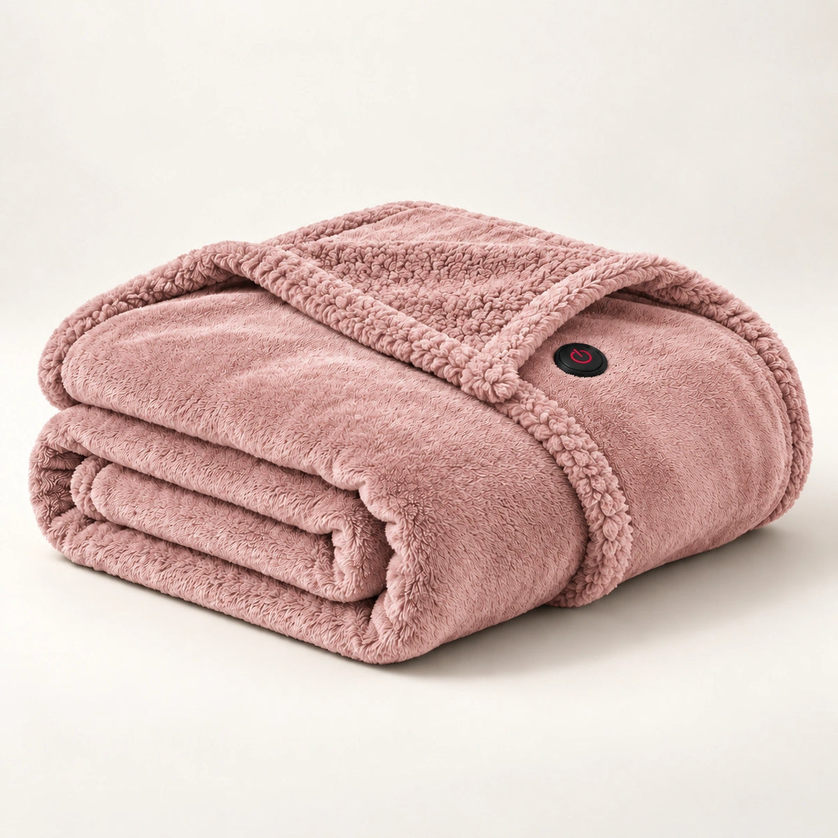 Pink heated wearable blanket folded on an ivory studio background