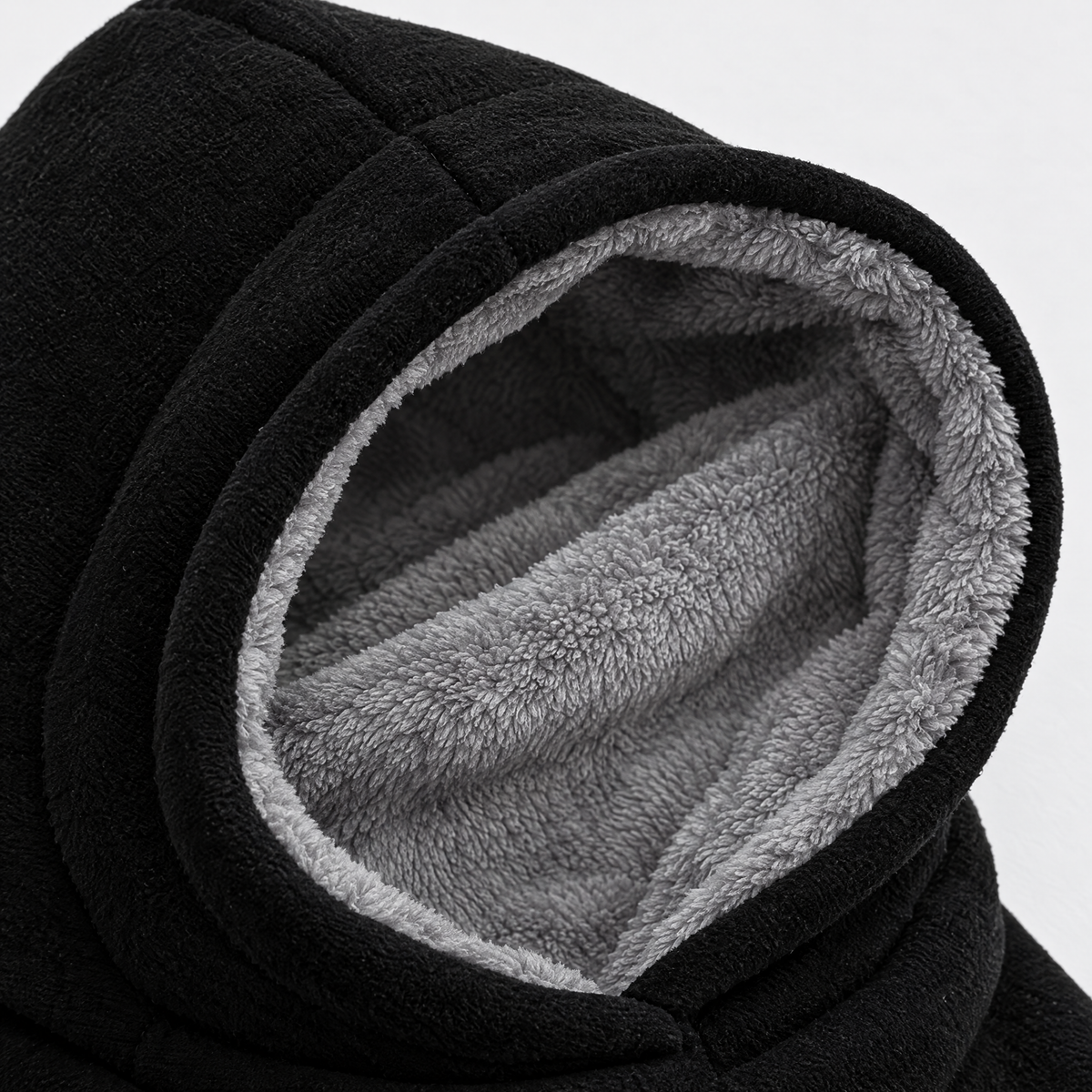 Gray plush lining inside the black fleece hood