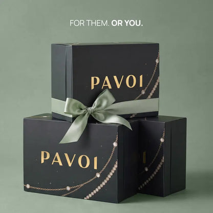 Two gift-ready PAVOI boxes with ribbon and For them. Or you. text